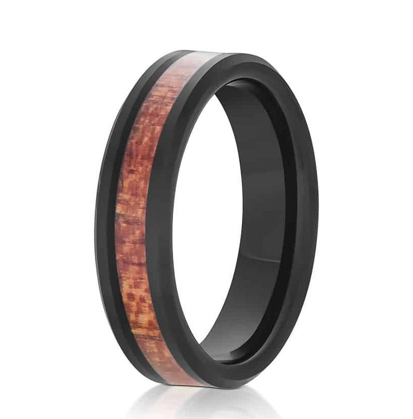 The Bridger, a 6mm black tungsten carbide ring with a sleek, polished finish and Hawaiian Koa wood inlay.
