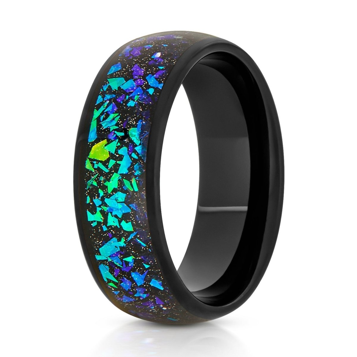 The Crucible, a 8mm black tungsten ring with a polished finish and domed design that features a green opal and abalone fragments inlay in the center.