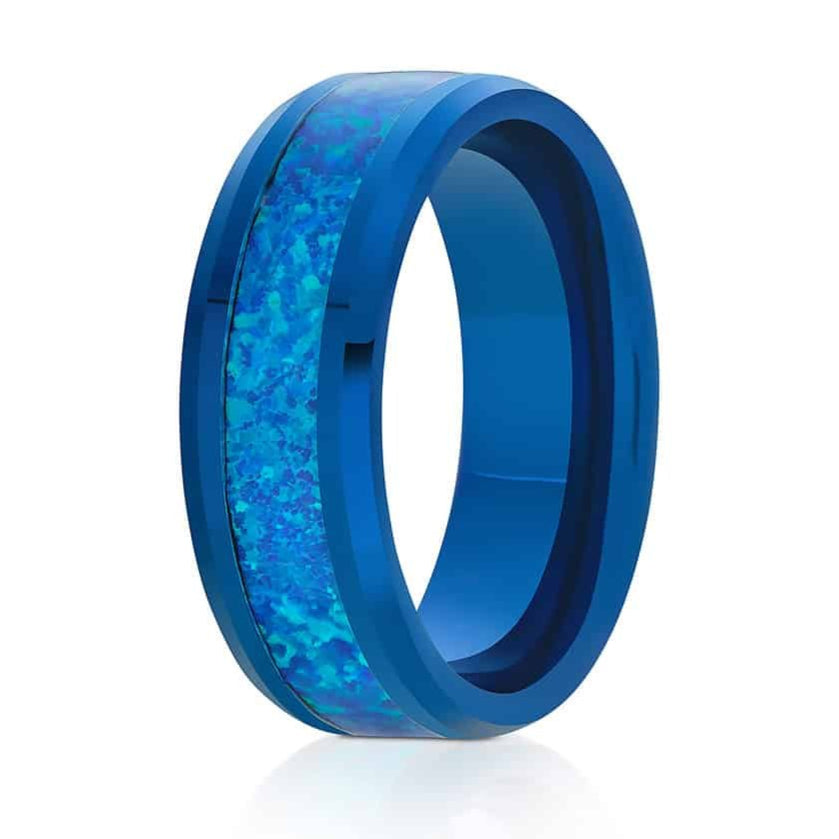 The Drunken, a 8mm blue tungsten carbide ring that features a polished finish and blue and green opal inlay.