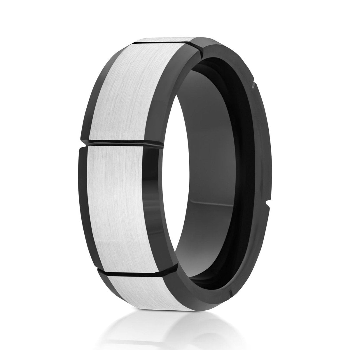 The Gridline, a 8mm two tone ring with a brushed silver center and polished black edges with multiple vertical grooves around the ring.
