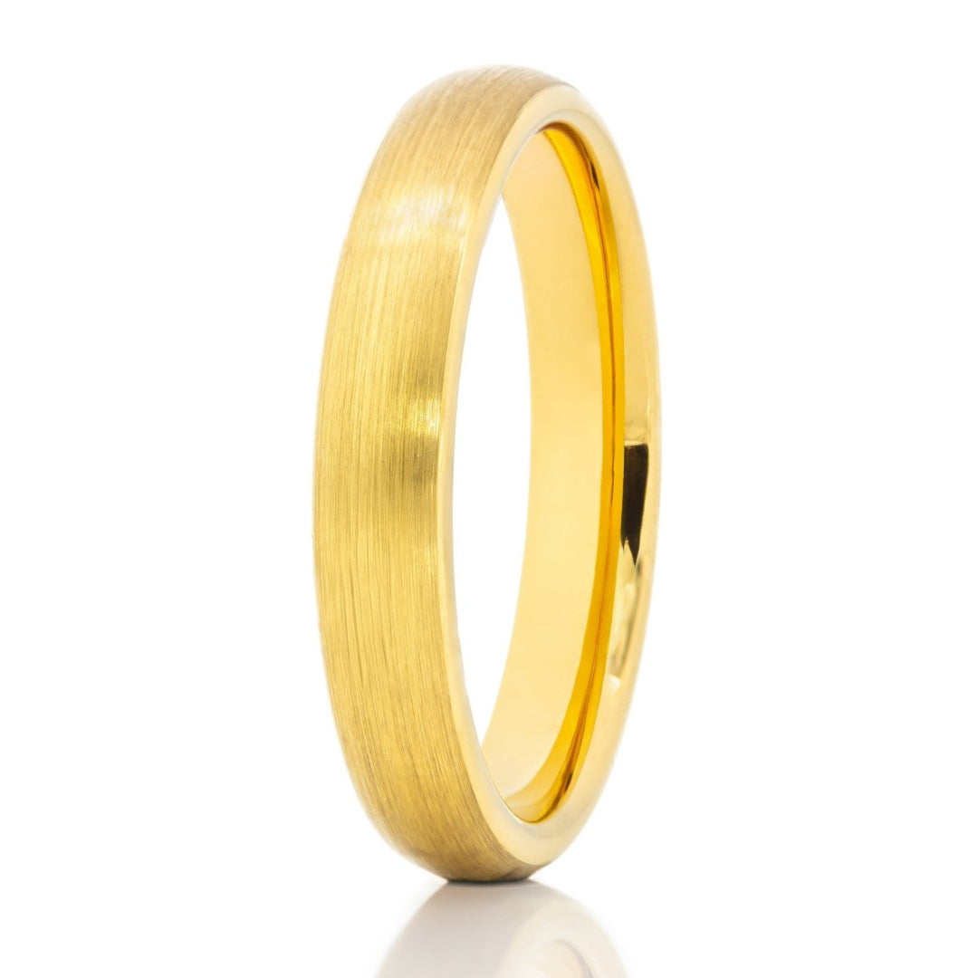 The Hakeem, a 4mm gold tungsten carbide scratch-resistant ring, features a brushed finish and domed style.
