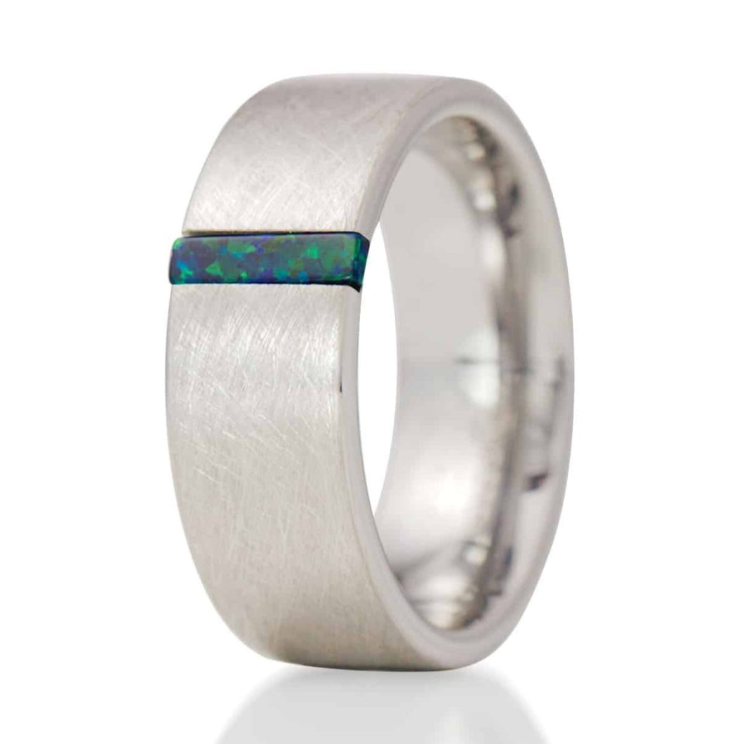 The Latour, a 8mm silver tungsten ring with a wire brushed finish and a green opal inlay.