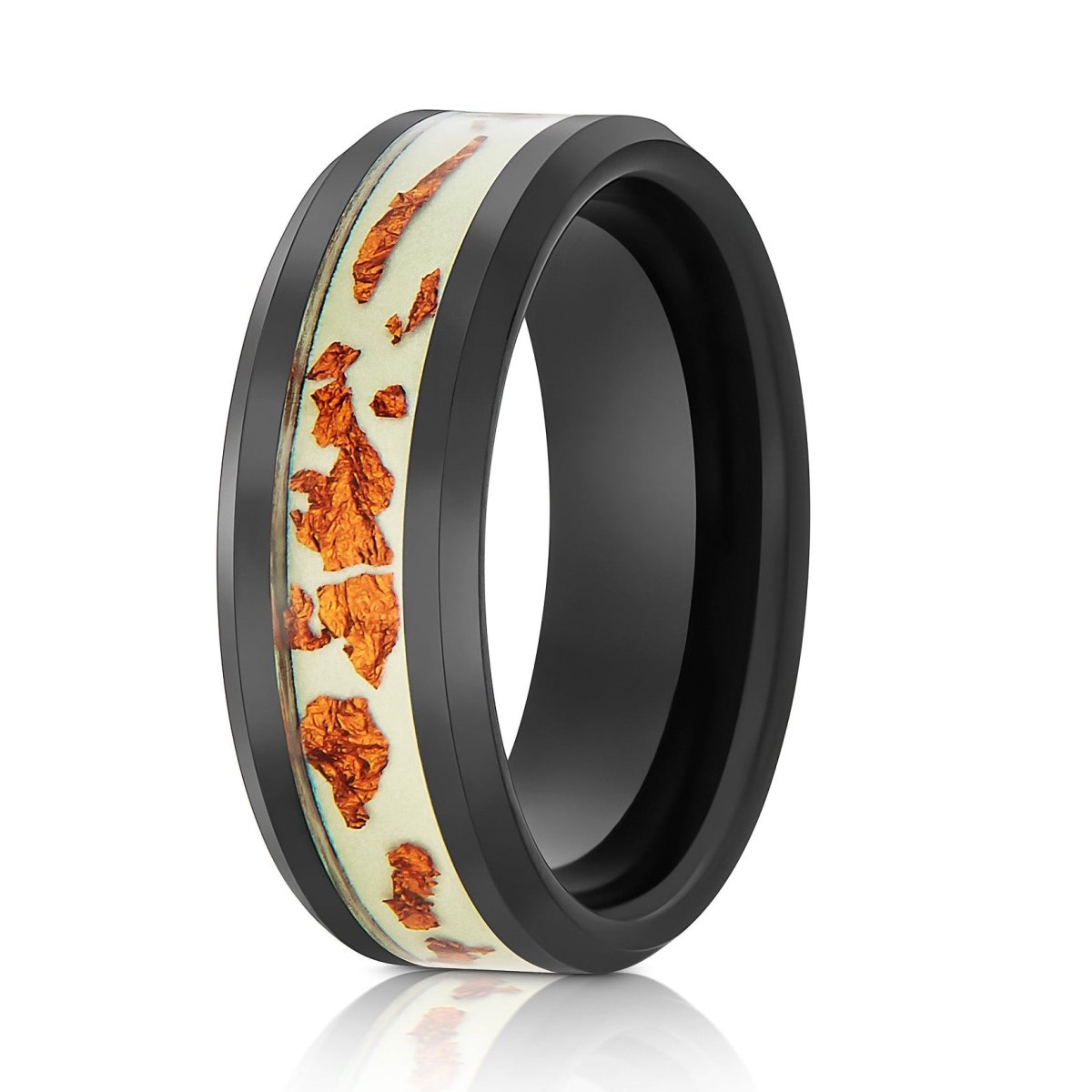 The Lumen, a black tungsten ring with a polished finish and a glow-in-the-dark film inlay with copper scraps over it.