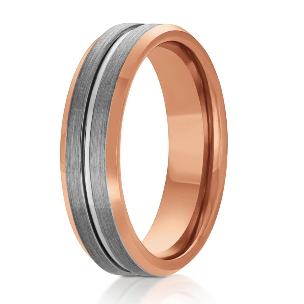 The Mars, a 6mm rose gold and gray tungsten carbide ring that features a brushed, gray center and polished grooved center with a polished rose gold band and edges.