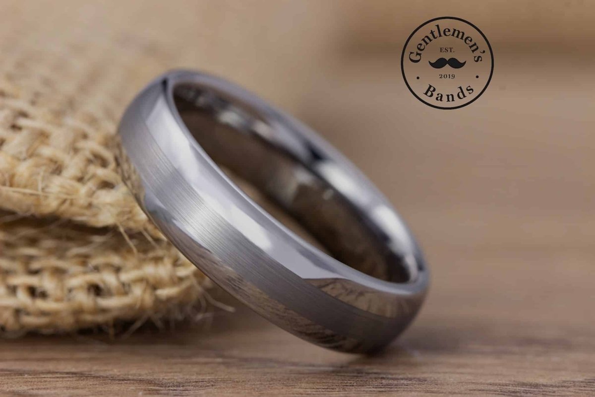 The Minimalist, silver mens anniversary or wedding ring with a burlap background