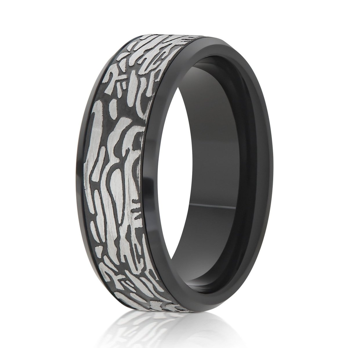 The Petroglyph, a 8mm black tungsten ring with a polished finish that features a laser engraved rock art pattern in the center.