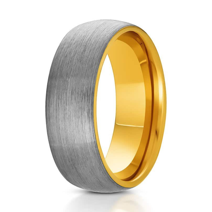 The Rawlings, a silver tungsten carbide scratch-resistant ring that features a brushed finish and sleek, polished gold band.