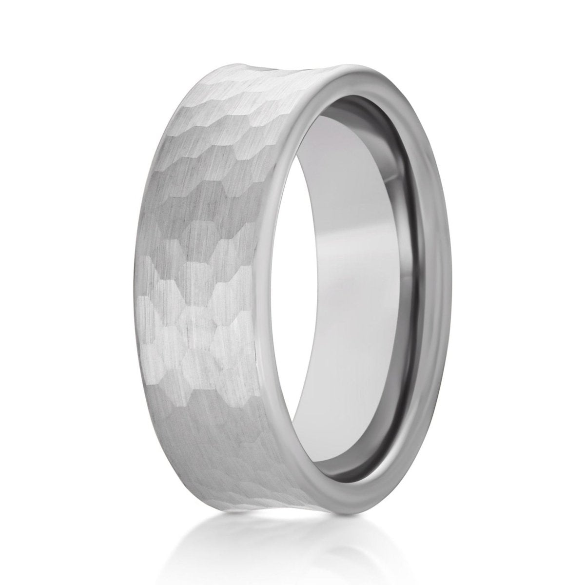 The Stonewell, a 8mm silver tungsten ring with a concave design and a hammered and brushed finish.