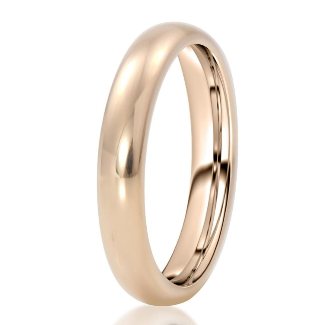 The Wilder, a 4mm rose gold tungsten carbide scratch-resistant domed ring that features a sleek, polished finish.