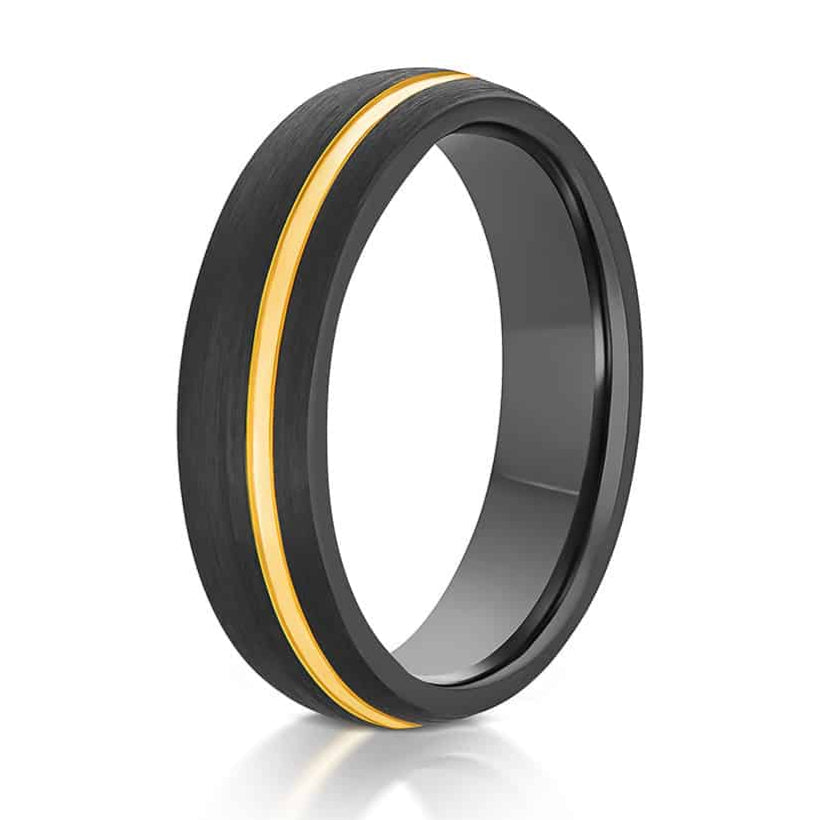 The Brimstone, a 6mm gray tungsten ring with a domed design and brushed finish with an off-center polished gold groove.