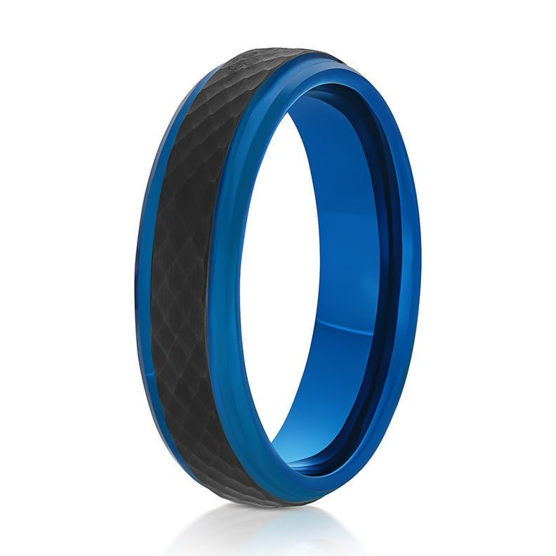The Ganymede, a 6mm black and blue tungsten carbide ring that features a hammered and brushed black center and polished blue edges and band.