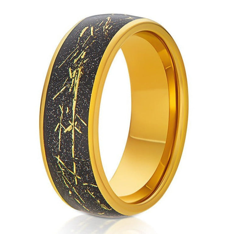 The Glaciares, a gold 8mm tungsten ring with a polished finish and black and gold meteorite inlay.