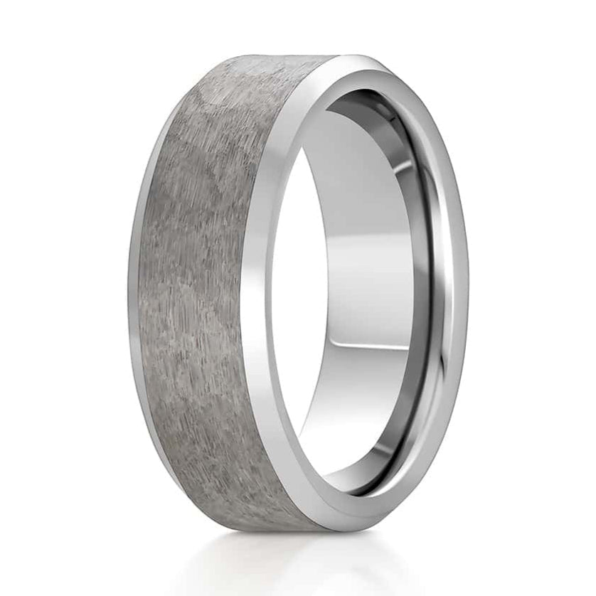 The Nicholson, a 8mm silver tungsten carbide ring that features a hammered and brushed center with sleek, polished edges.