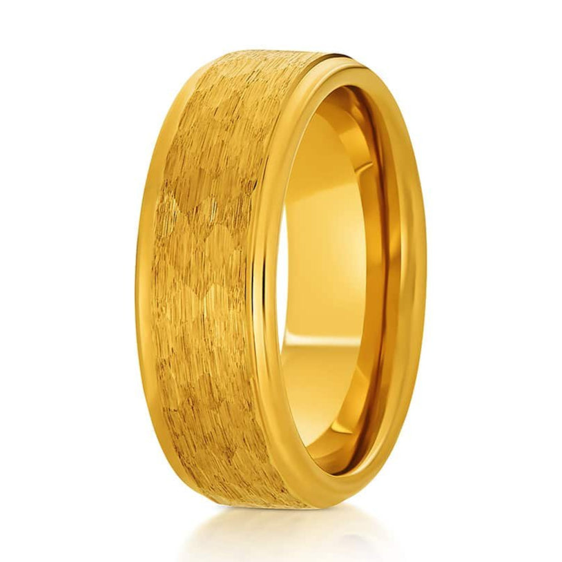 The Tayrona, a gold tungsten carbide scratch-resistant ring with a hammered and brushed finish and sleek, polished edges.