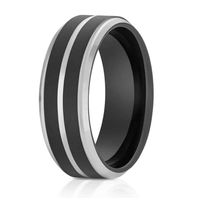 The Abilene, a 8mm black and silver tungsten carbide ring that features a brushed black center, and a polished silver groove and edges.
