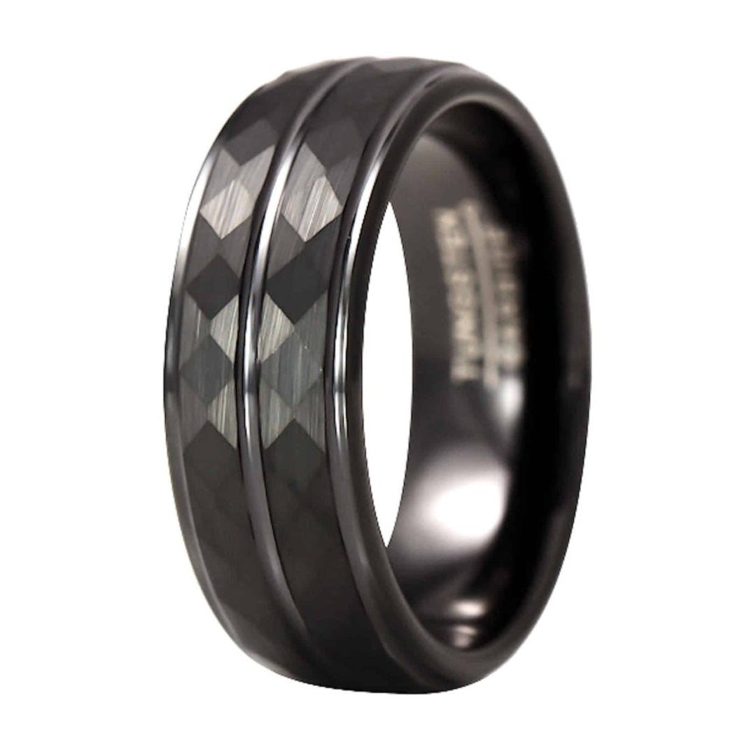 The Babylon, a 8mm black tungsten carbide ring with a faceted and brushed finish, with polished edges and a grooved center.