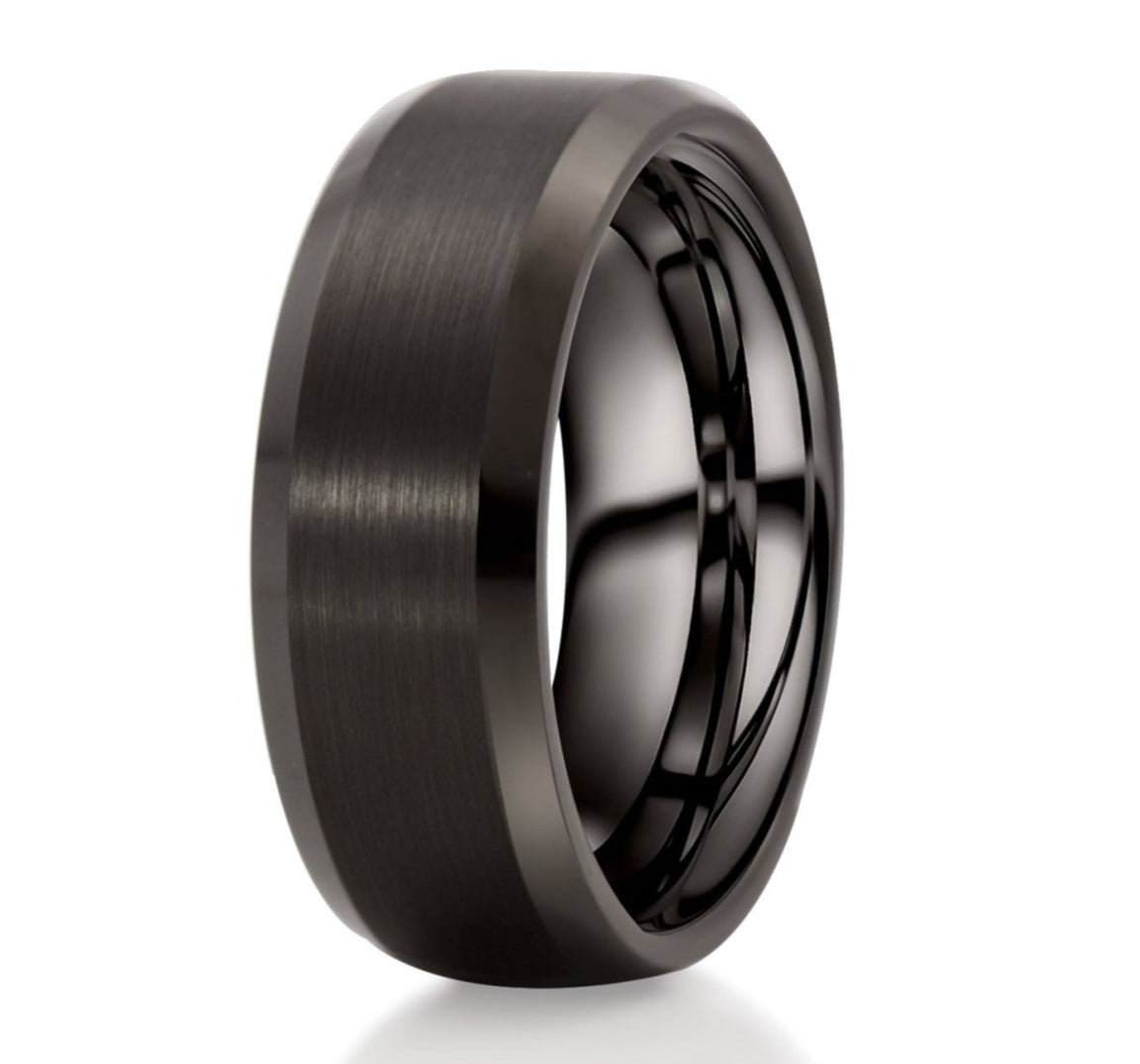 The Billionaire, a black scratch resistant tungsten carbide ring that features a brushed finish center and polished edges.