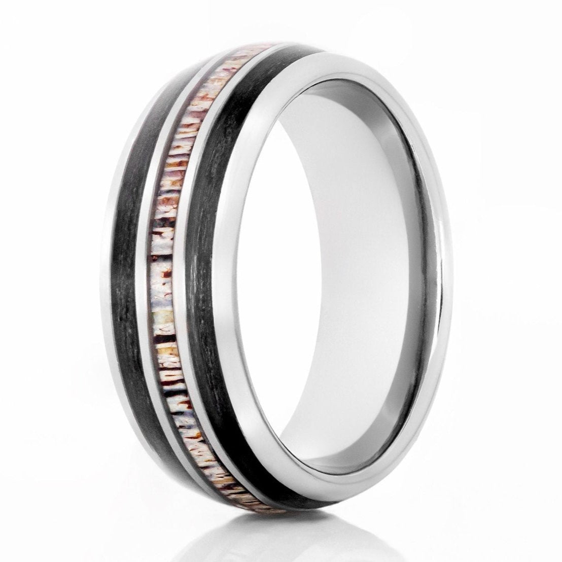 The Black Whiskey, a 8mm silver tungsten carbide ring with a polished finish that features a double charred whiskey barrel wood inlay and a deer antler inlay in the center.