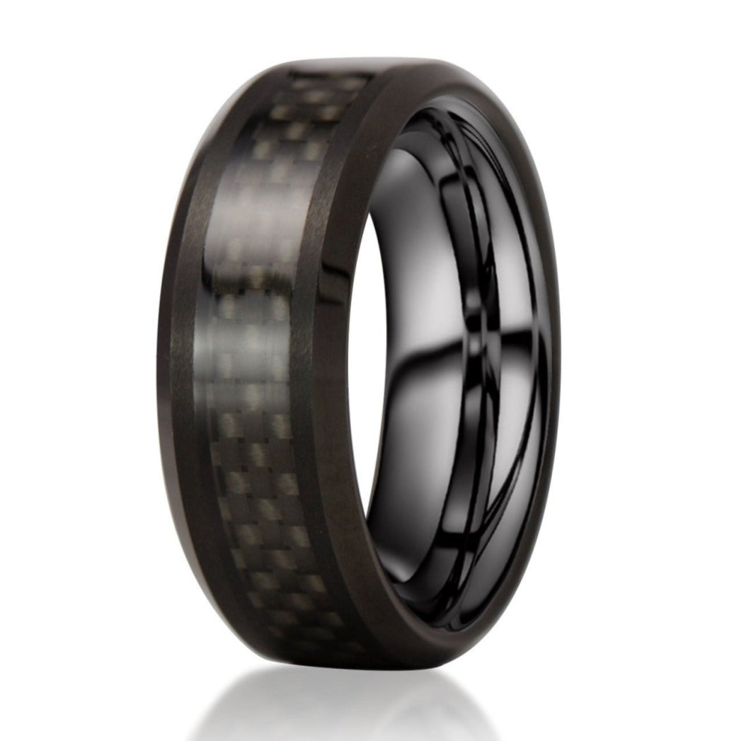 The Cassidy, a black tungsten ring with a polished finish and black carbon fiber inlay.