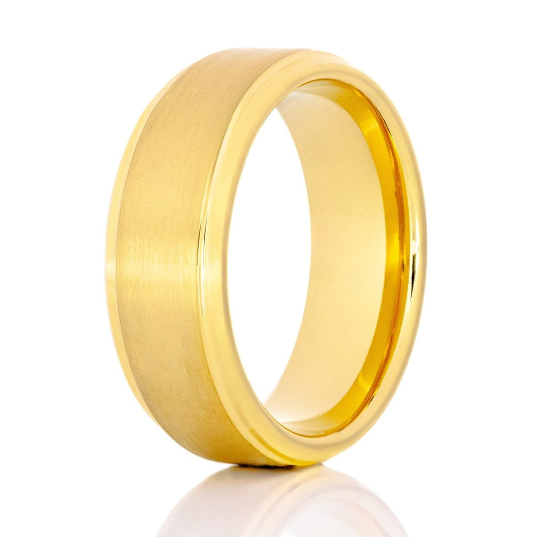 The Dene, a gold tungsten carbide scratch-resistant ring that features a brushed center and sleek, polished edges.