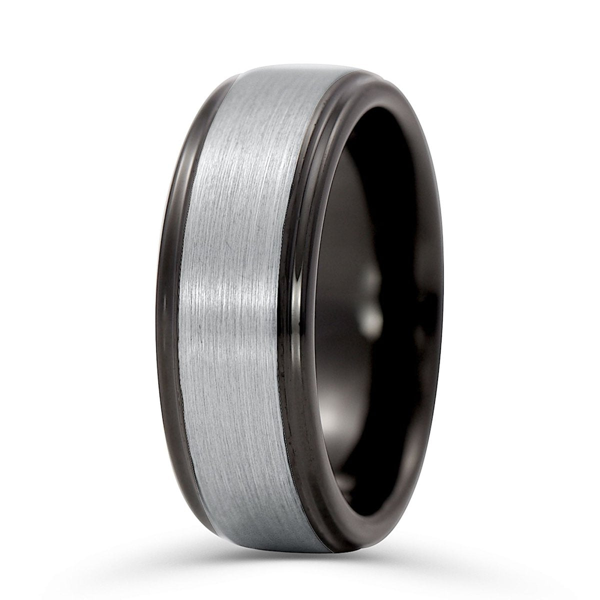 The Eagle, a black and silver tungsten carbide ring that features a silver, brushed center, and sleek, black polished edges and band.
