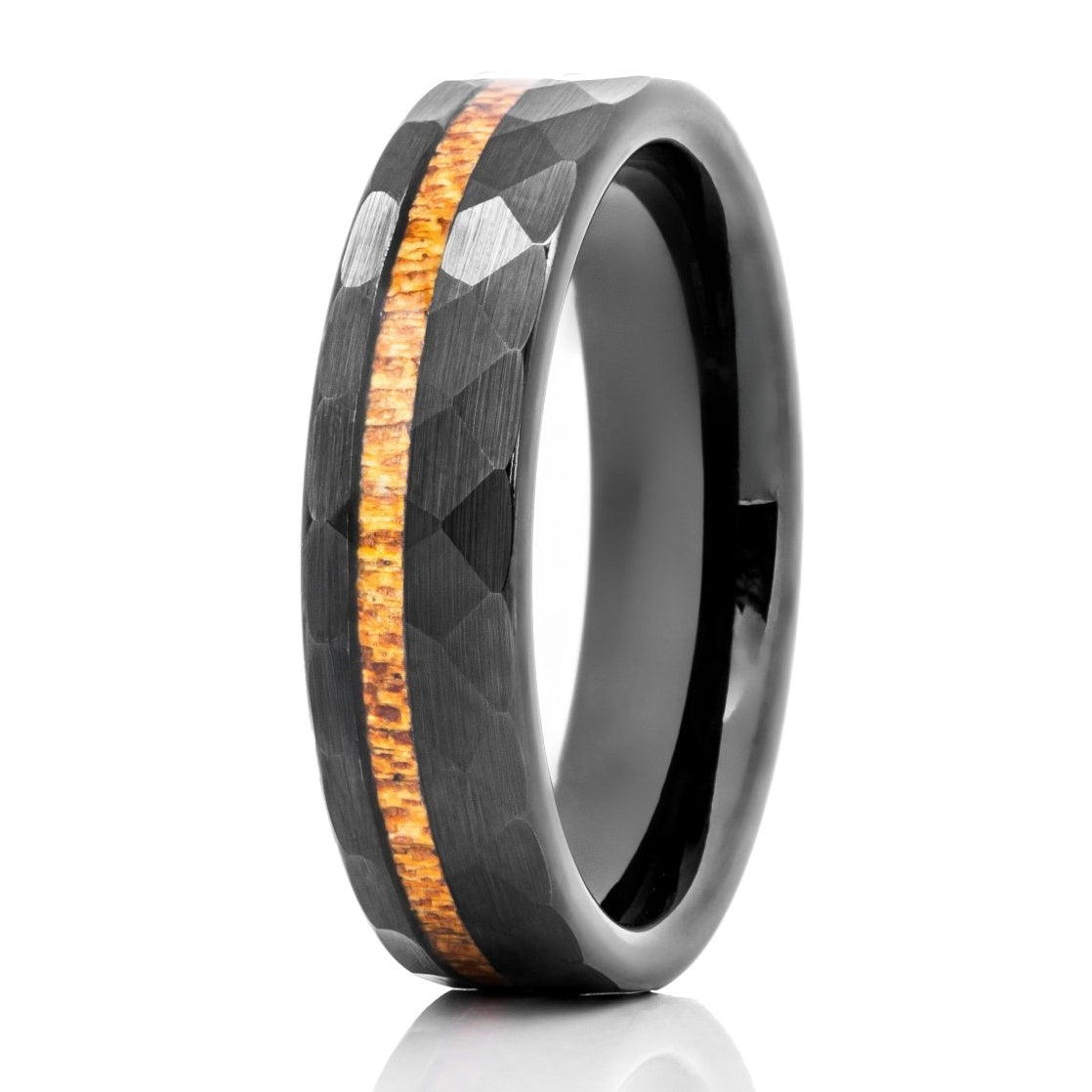 The Eleu, a 6mm hammered and brushed black tungsten scratch-resistant ring with a Hawaiian Koa wood inlay.