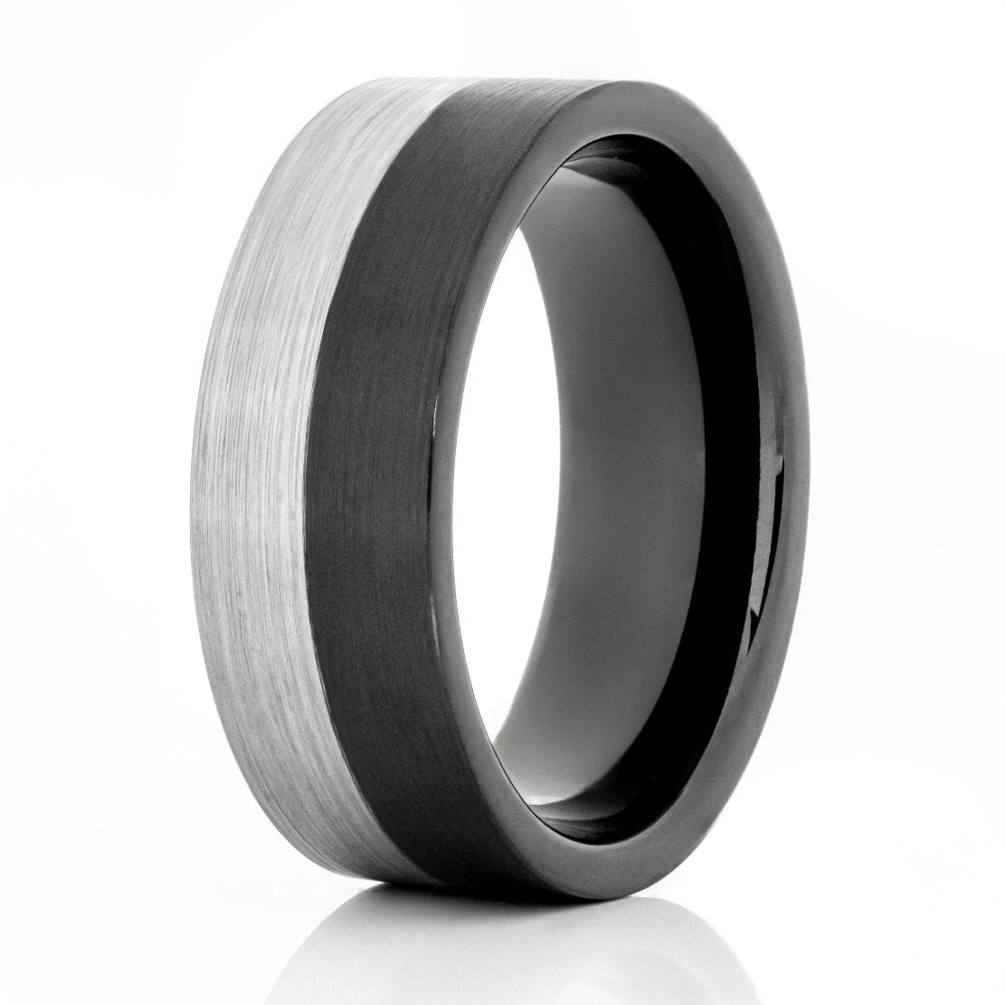 The Extraterrestrial, a black and silver tungsten carbide scratch-resistant ring that features a pipe cut and brushed finish.