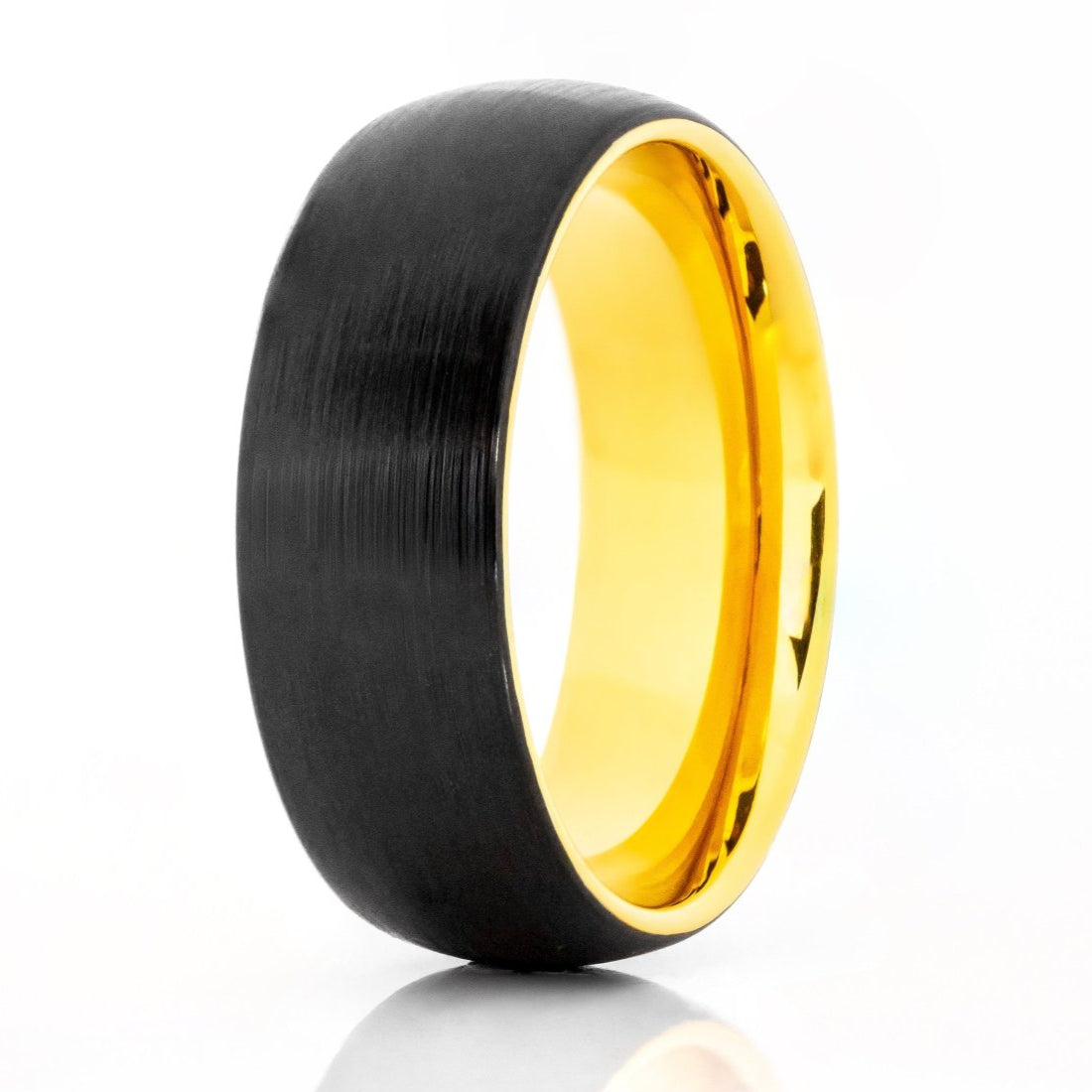 The Fossil Ridge, a 8mm black and gold tungsten carbide scratch-resistant ring that features a black brushed finish and polished gold inner band.