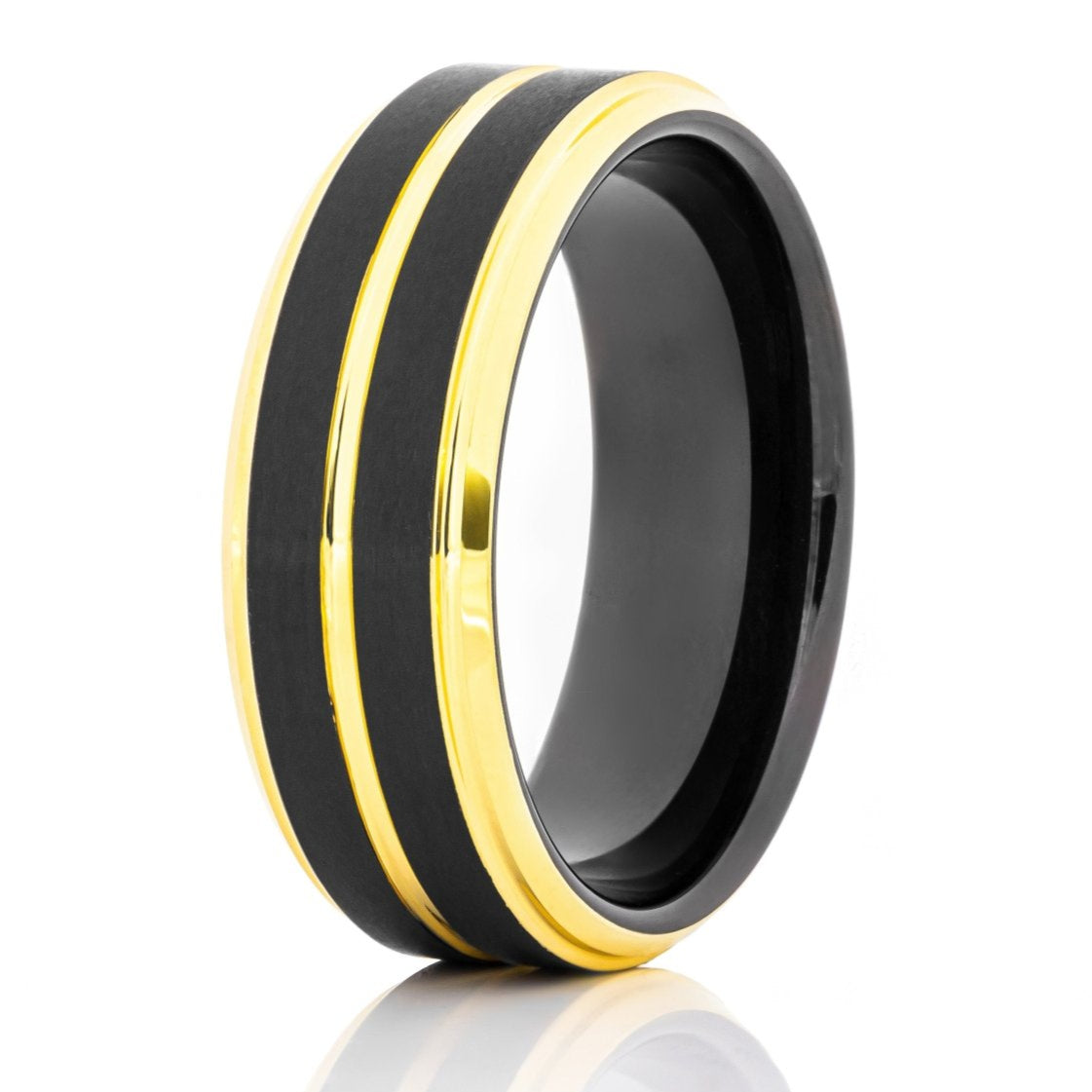 The Fulvous, a 8mm black and gold tungsten ring that features a brushed, black center and a polished gold groove and polished gold edges.