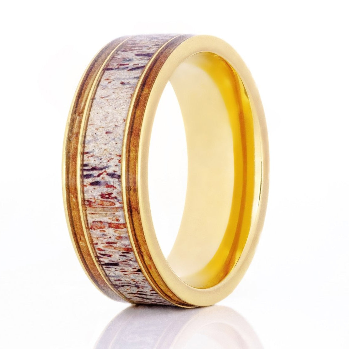 The Gold Antler, a 8mm gold tungsten carbide ring with a polished finish that features a double whiskey barrel wood inlay and a deer antler inlay in the center.