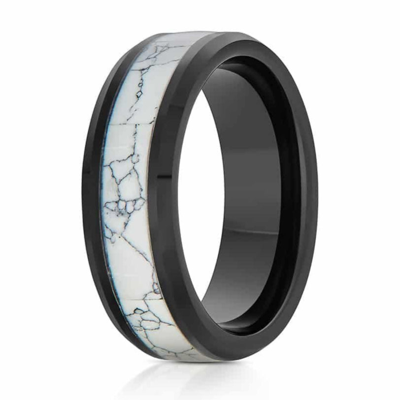 The Grifter, a 8mm black tungsten carbide ring with a polished finish that features a white turquoise inlay.