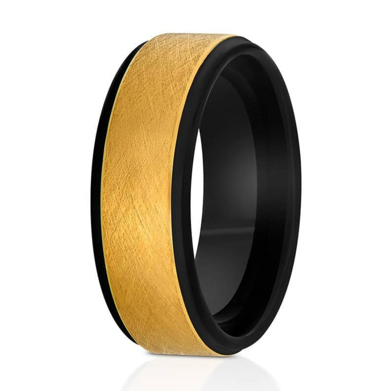 The Idol, a black and gold tungsten ring with a wire brushed center and polished band.