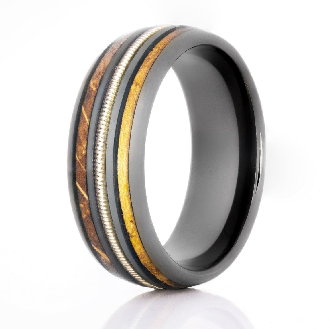 The Lead, a 8mm gray tungsten carbide with a polished finish that features a double whiskey barrel wood inlay with a guitar string in the center.