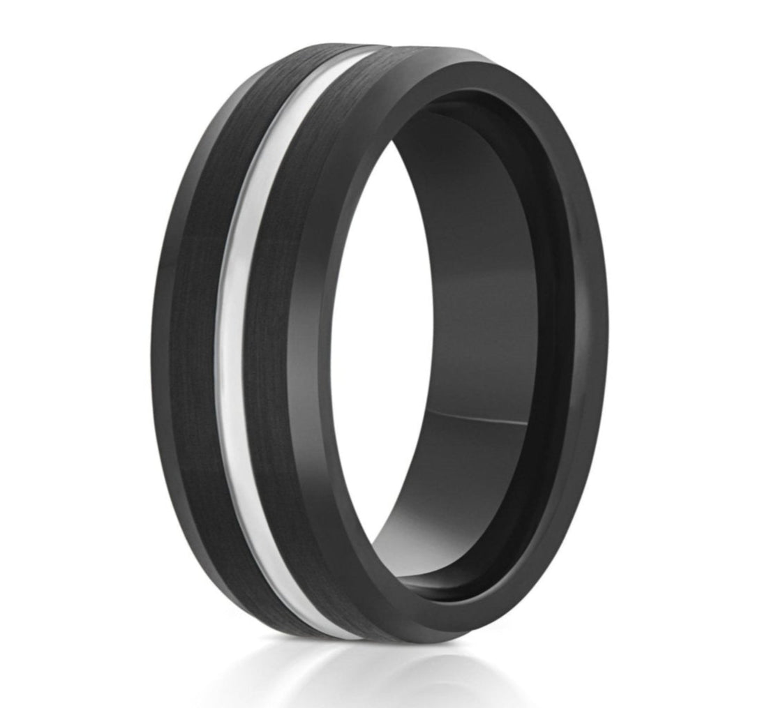The Lieutenant, a black tungsten carbide ring with a brushed center and polished edges with a silver grooved center.