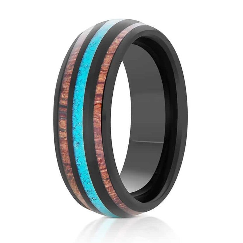 The Manchester, a black tungsten carbide ring with a polished finish that features a Hawaiian Koa wood double inlay and a crushed turquoise inlay in the center.