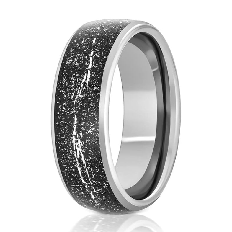 The Norte, a silver tungsten carbide ring that features a polished finish and black carbon fiber and metallic shavings inlay.