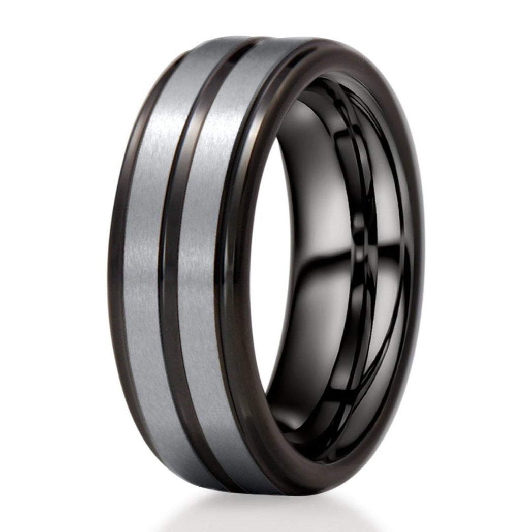 The Northern, a black tungsten carbide ring with a polished finish and brushed silver center.