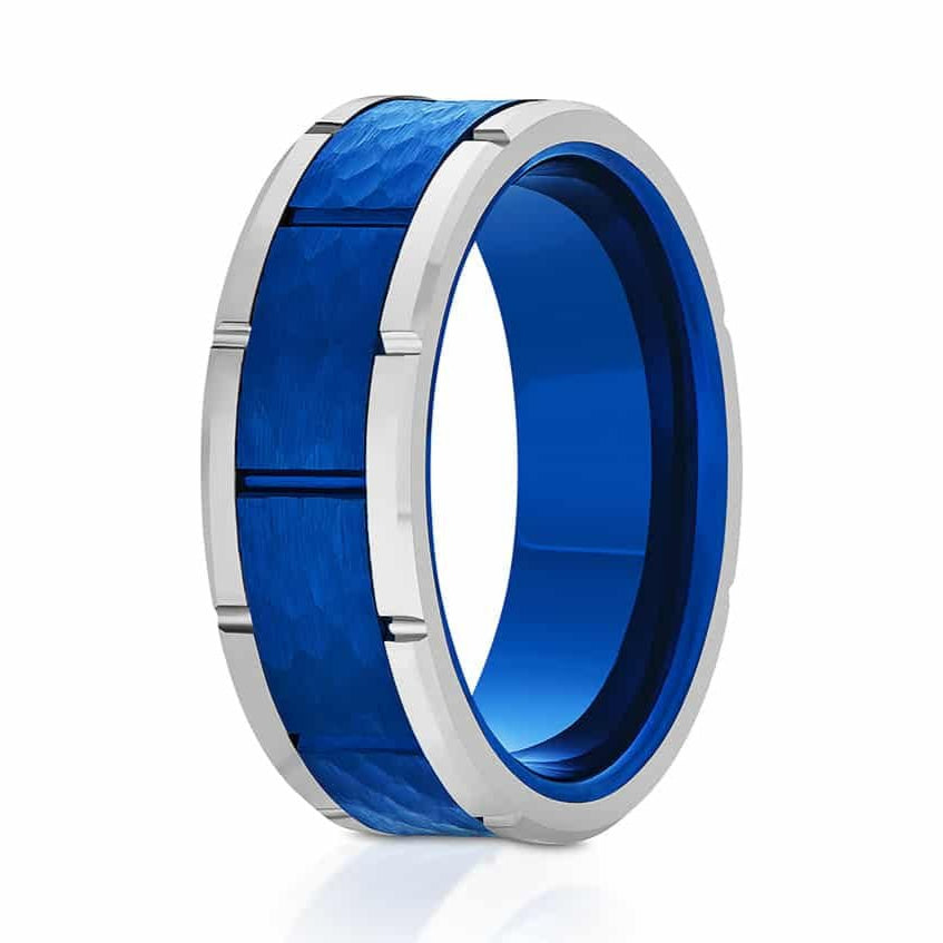 The Snow Goose, a 8mm blue and silver tungsten carbide ring that features a hammered and brushed blue center with polished silver edges with notches.