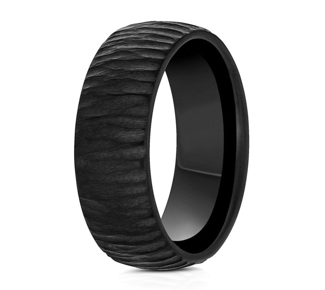 The Spy, an 8mm tungsten carbide scratch-resistant ring that features a carved finish.