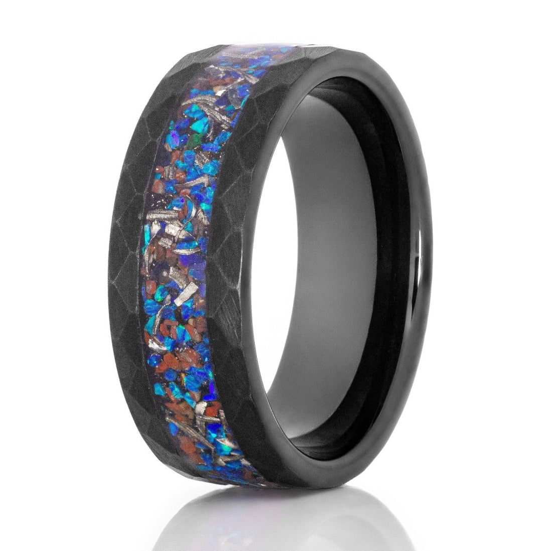 The T,  a 8mm black tungsten carbide ring with a hammered and brushed finish that features a beautiful opal, dinosaur bone, and meteorite inlay.