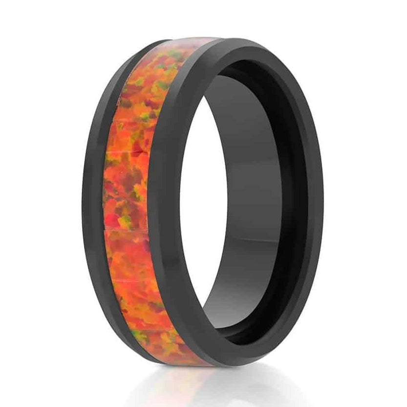 The Valley of Fire, a 8mm black tungsten carbide ring that features a sleek, polished finish and an orange opal inlay.