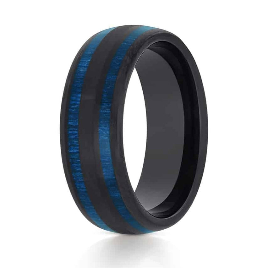 The Voyager, a black tungsten carbide ring that features a brushed center and polished edges and band with an exotic blue wood inlay.