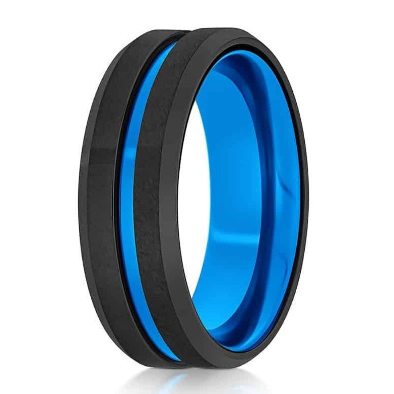 The Wingshooter, a black tungsten ring with a brushed center and polished edges that features a blue, grooved center and blue aluminum sleeve.