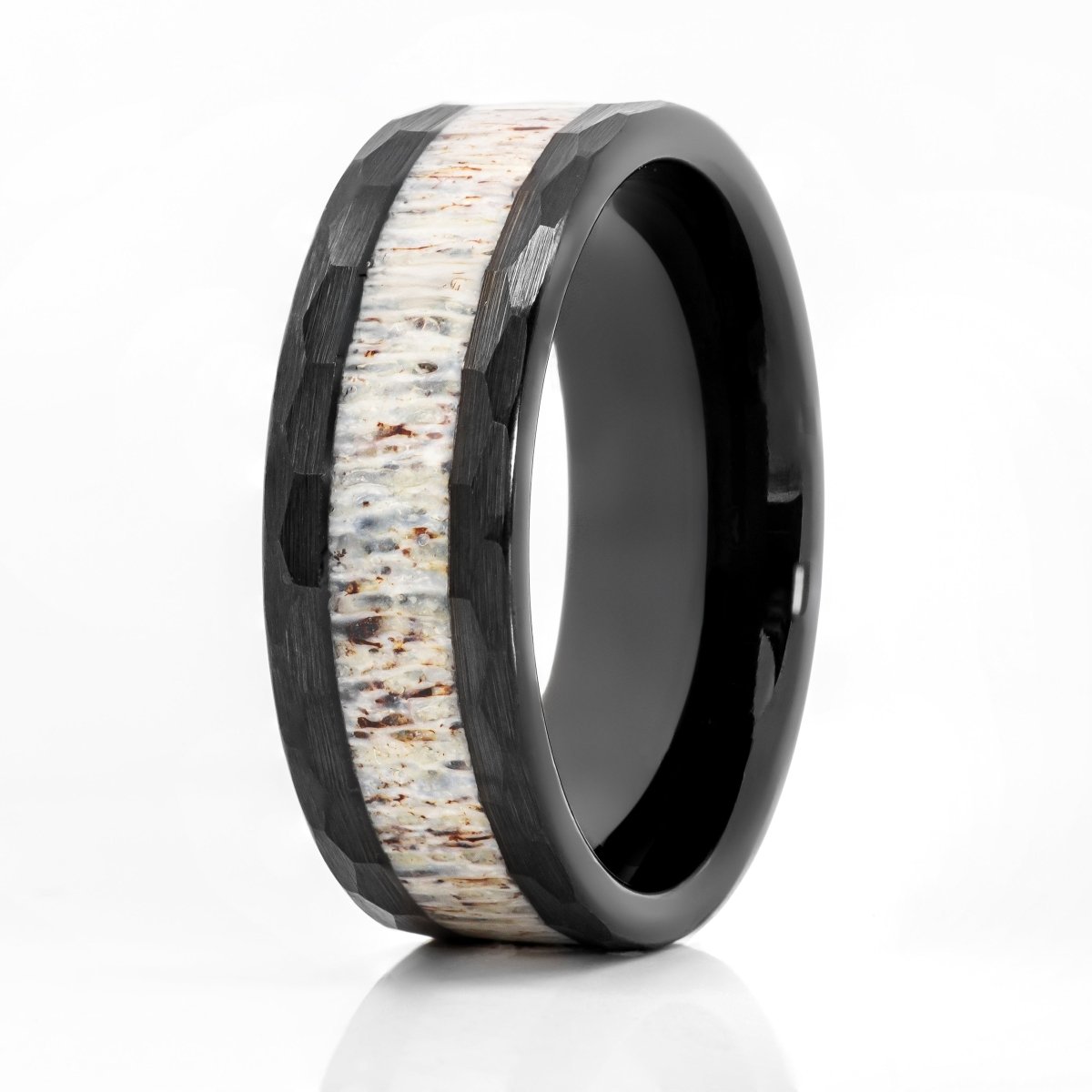 The Forester, a 8mm black tungsten carbide scratch resistant ring that features a hammered and brushed finish with a deer antler inlay.