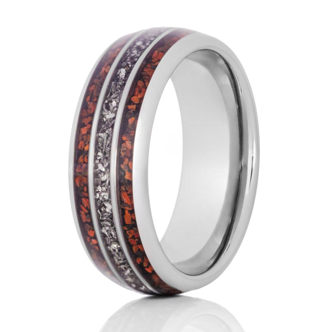 The Triceratops, a silver tungsten carbide scratch resistant ring that features a polished finish and meteorite and dinosaur bone inlay.