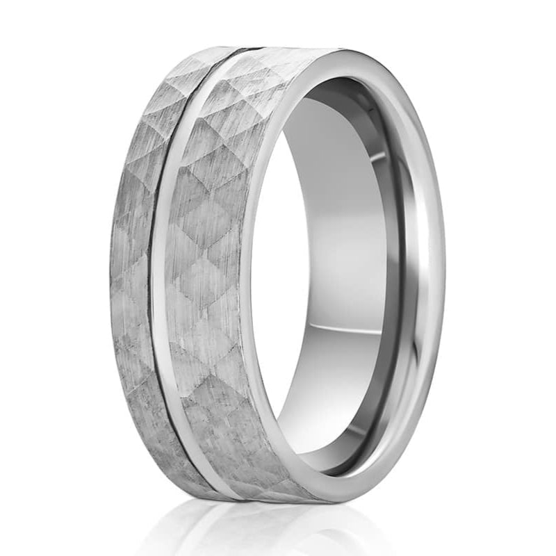The Architect, a 8mm silver tungsten carbide ring with a hammered and brushed finish and polished groove and band.