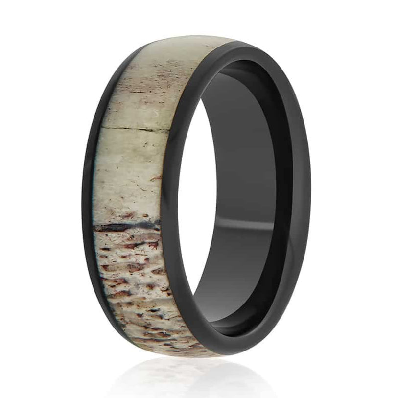 The Bighorn, a black tungsten carbide scratch resistant ring with a polished finish and deer antler inlay.