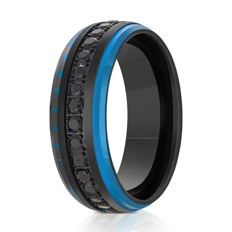 The Blue-Winged, a black and blue tungsten carbide ring that features a brushed, black center and polished blue edges, and black CZ diamonds in the center.