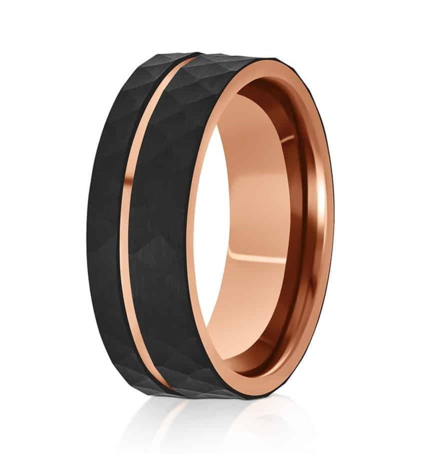 The Genius, a black and rose gold tungsten ring that features a black hammered and brushed center with a polished rose gold groove and inner band.