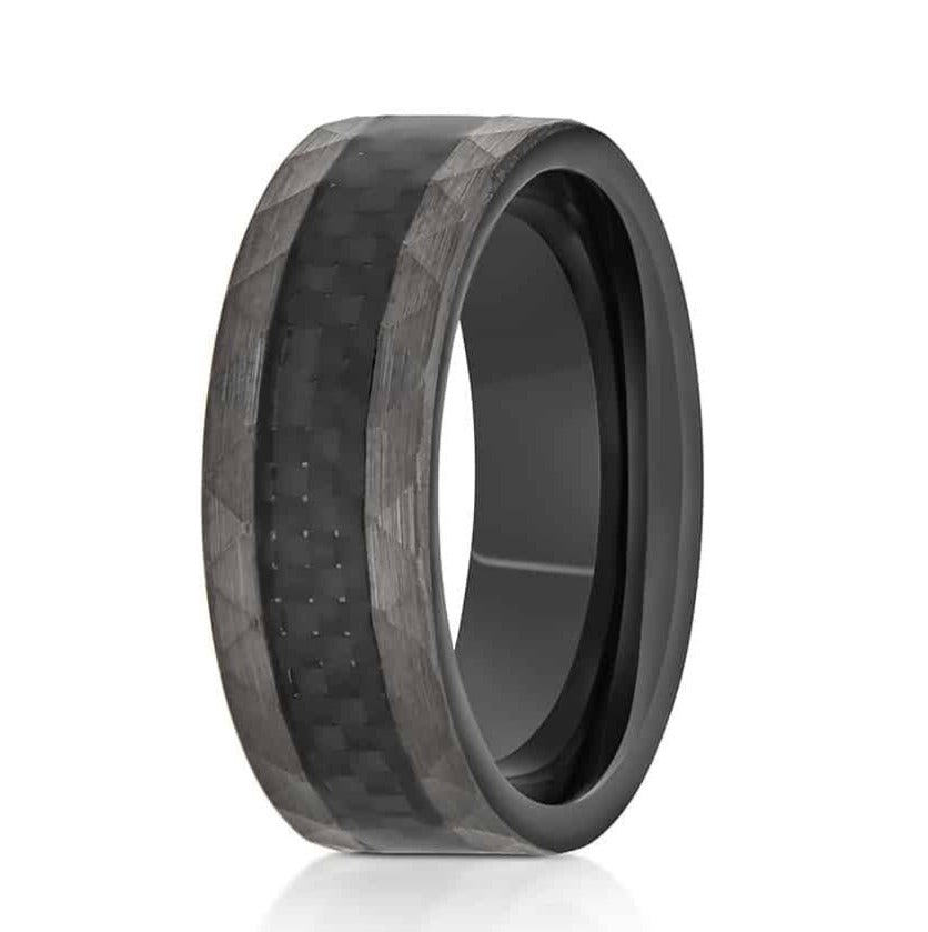 The Hero, a gray tungsten carbide ring that features a hammered and brushed finish and a black carbon fiber inlay.